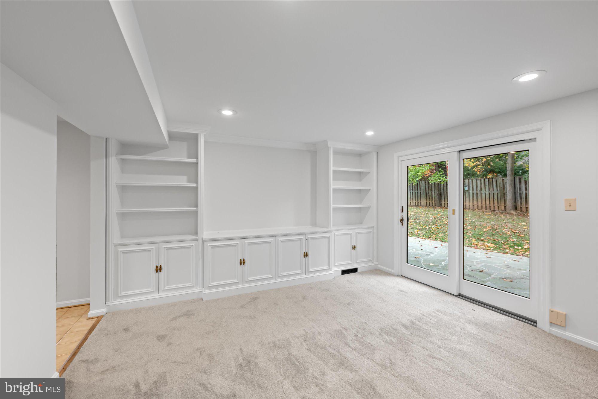 8311 Aqueduct Road Potomac, MD 20854 - Photo 10 of 27 a view of an empty room with a window