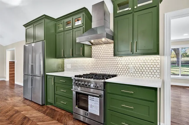 a kitchen with a cabinets and a stove top oven