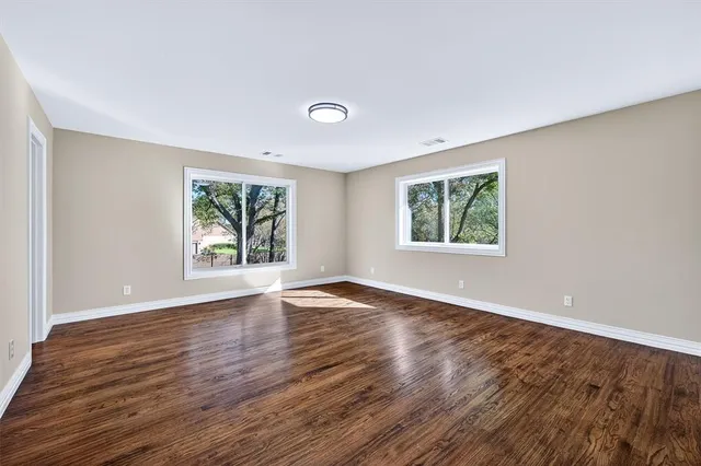a bathroom with a sink a mirror and a shower
