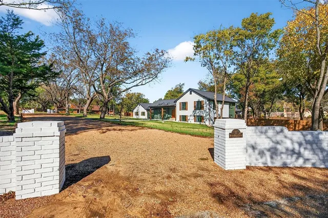 a view of house with outdoor space
