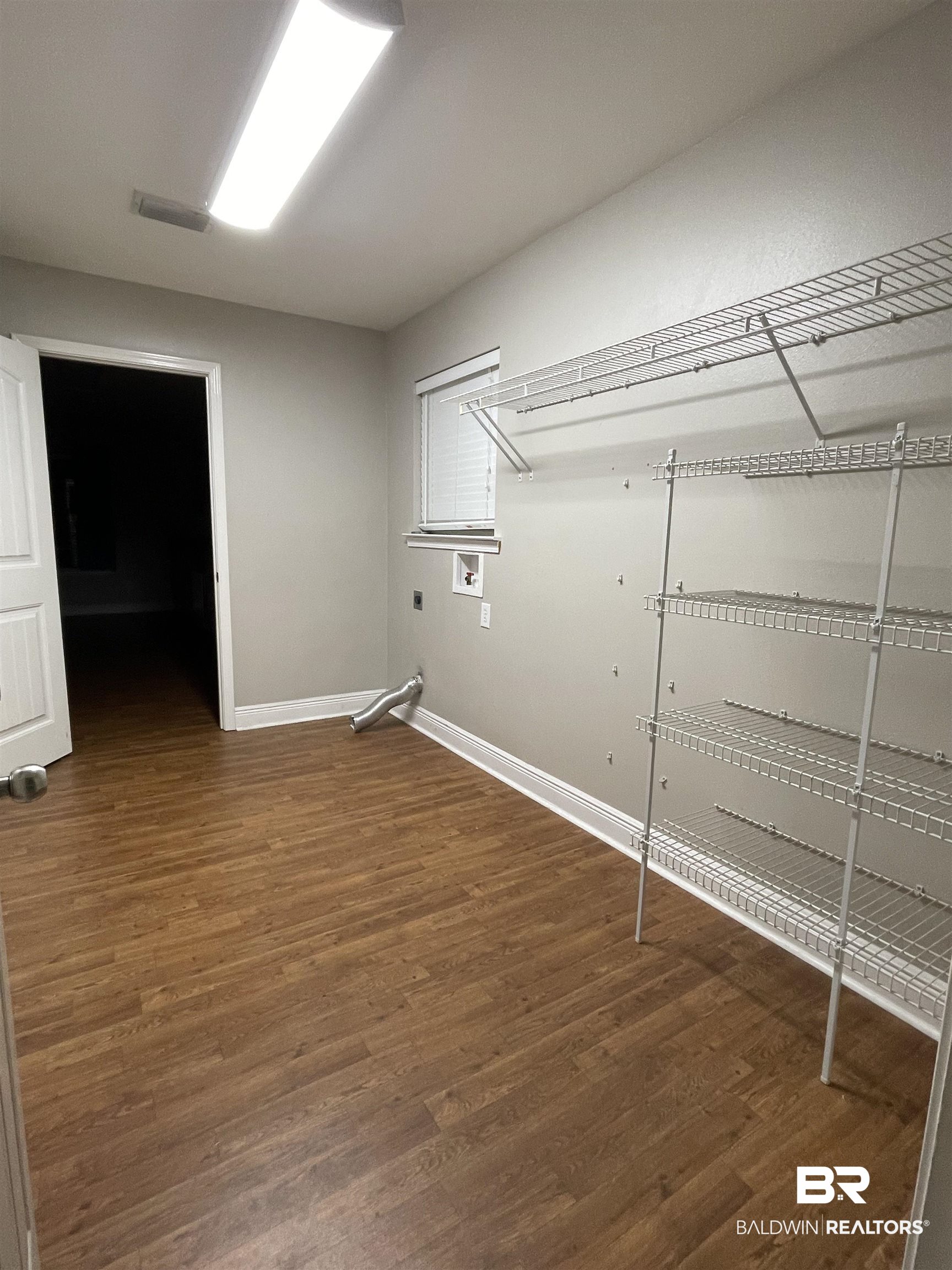 10753 Rigby Drive Mobile, AL 36695 - Photo 22 of 33 Spacious Mud Room / Laundry area off the kitchen. Accessible from the attached 2 car garage.