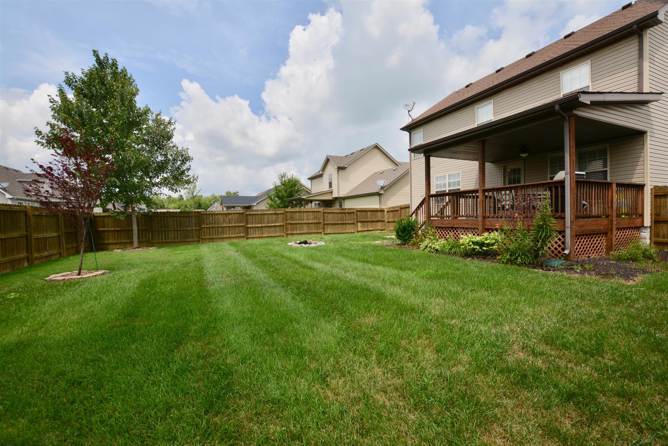 3778 Suiter Road Clarksville, TN 37040 - Photo 3 of 16 a view of a house with a backyard