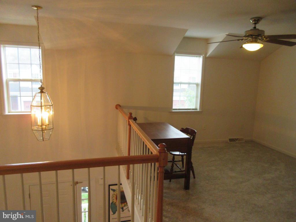 629 Chatham Way Lititz, PA 17543 - Photo 12 of 18 a view of a hallway with windows