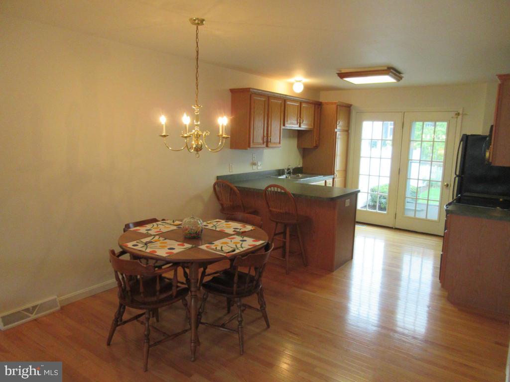 629 Chatham Way Lititz, PA 17543 - Photo 5 of 18 a view of a dining room with furniture and wooden floor