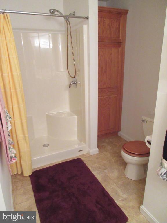 629 Chatham Way Lititz, PA 17543 - Photo 10 of 18 a bathroom with a shower and a toilet