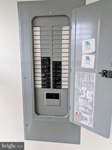 a bathroom with a sink a mirror and a toilet