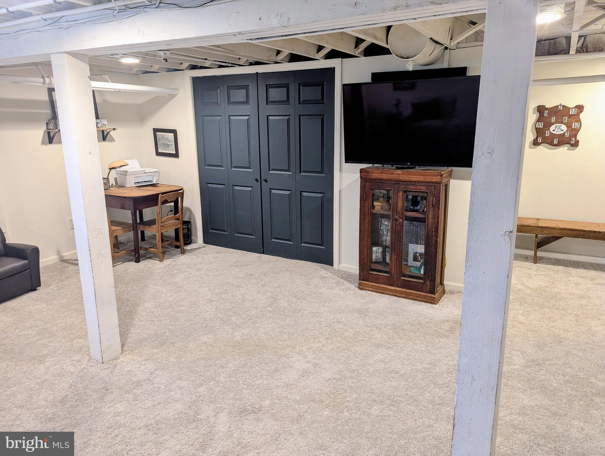 3 Locust Lane Womelsdorf, PA 19567 - Photo 32 of 37 a view of a livingroom with furniture and a flat screen tv