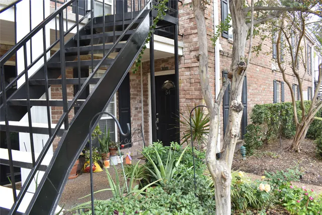 a view of a livingroom with a staircase