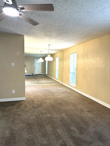 a view of cabinets and window