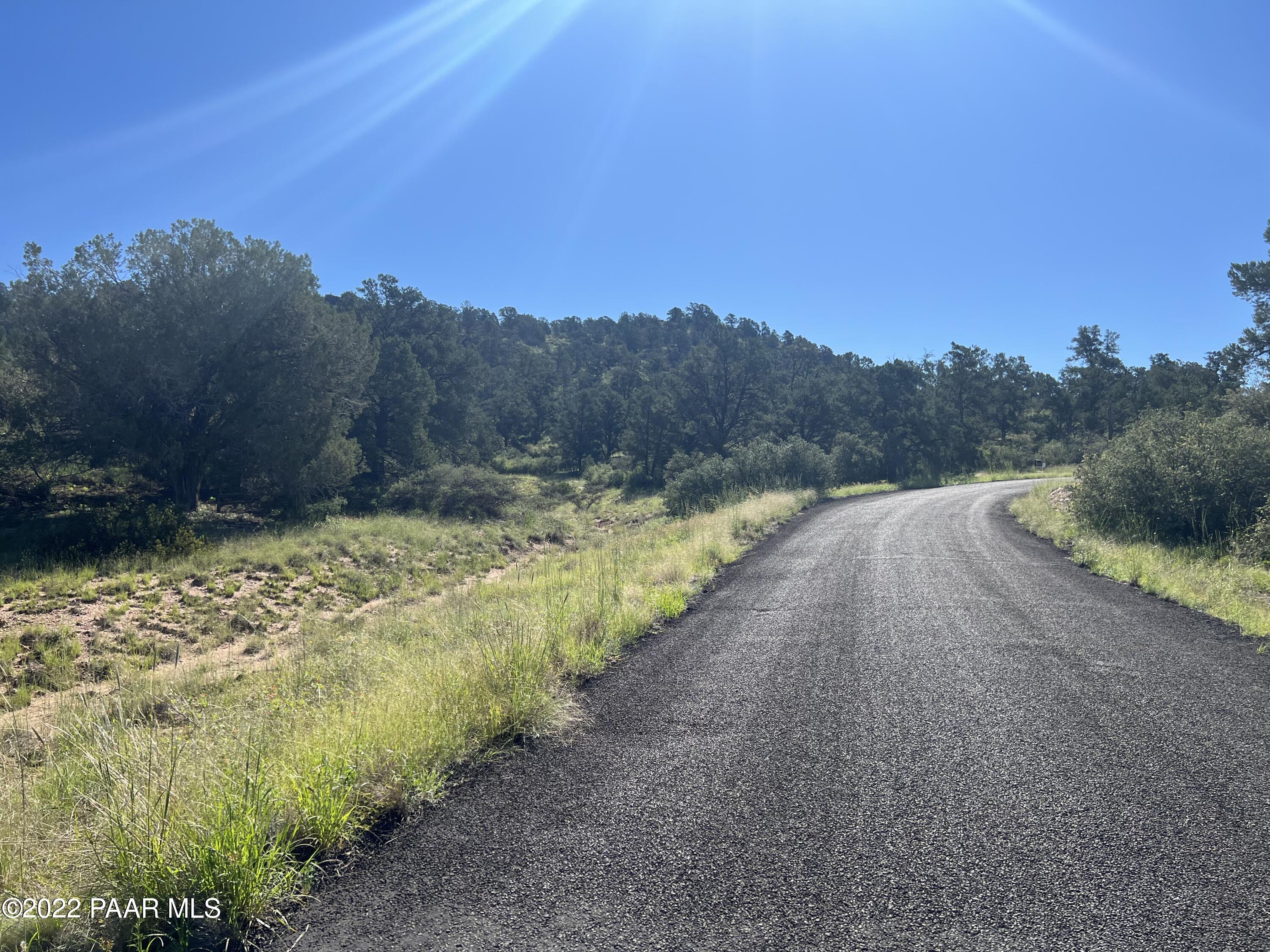 16301 Petroglyph Road Prescott, AZ 86305 - Photo 26 of 32 a view of a pathway with a yard