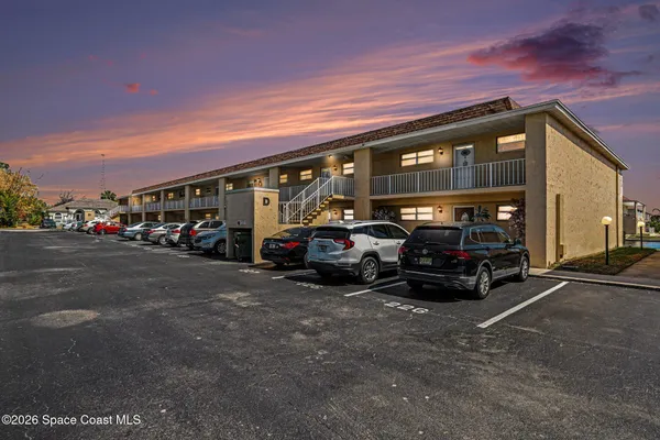 a car parked in front of a building
