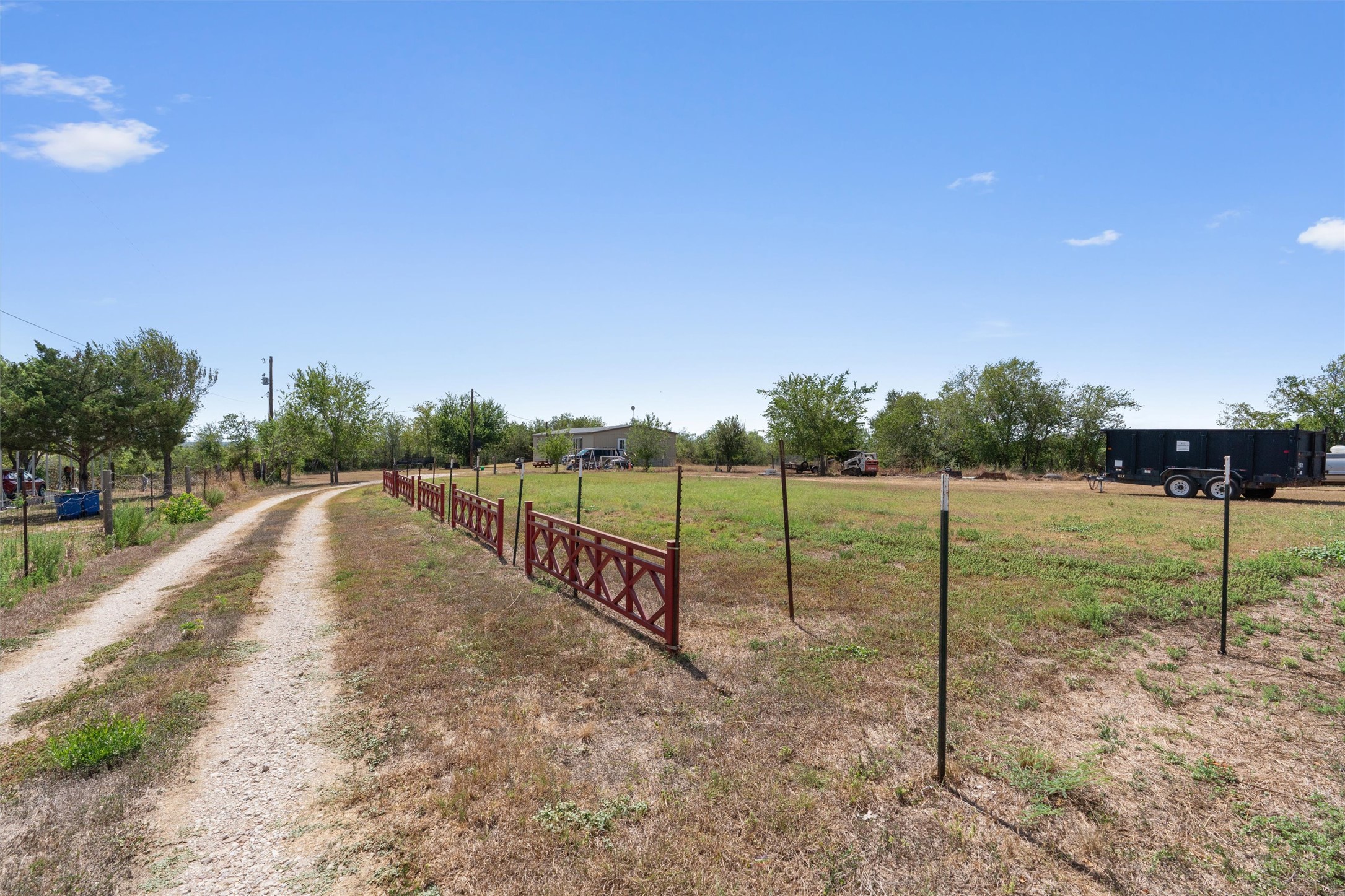 13111 Elm Grove Road Buda, TX 78610 - Photo 21 of 39 driveway to back property