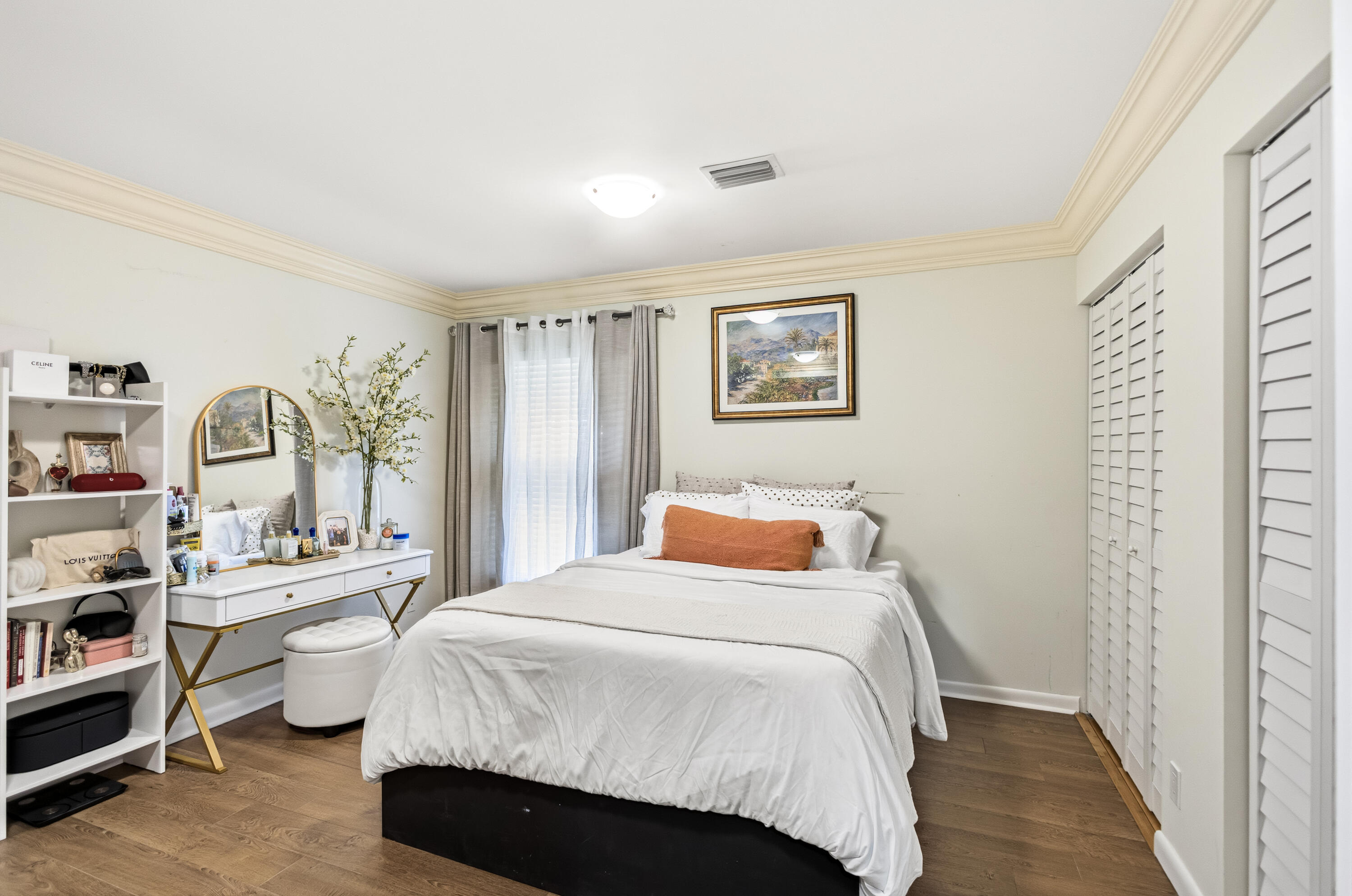 5223 Deerhurst Crescent Circle Boca Raton, FL 33486 - Photo 38 of 51 a bedroom with a bed large window and wall painting