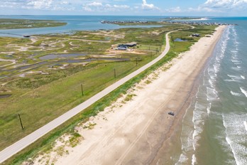 11621 Bluewater Highway Freeport, TX 77541 - Photo 3 of 6 a view of an ocean and beach