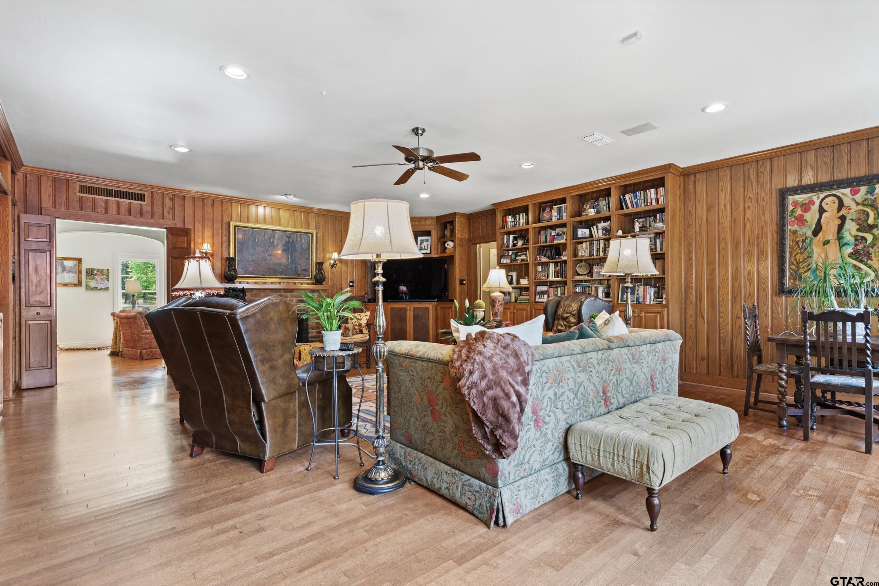 2631 Old Bullard Road Tyler, TX 75701 - Photo 13 of 43 a living room with furniture and wooden floor