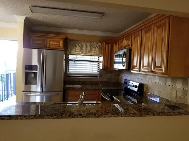 $1,874 | 1561 Balfour Point Drive, Unit H, West Palm Beach, FL 33411