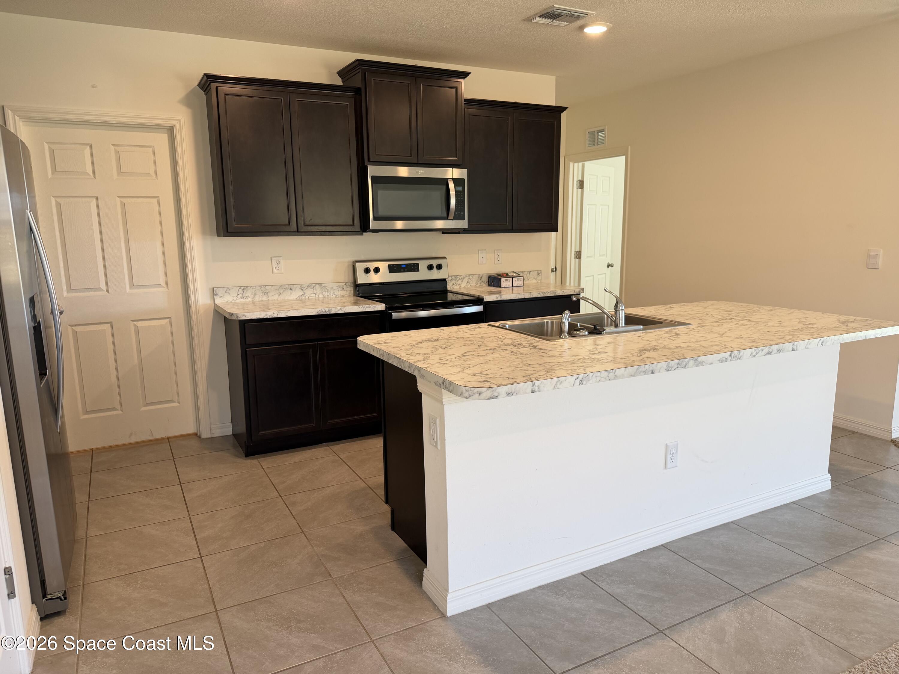 966 Trinity Street Rockledge, FL 32955 - Photo 3 of 14 Kitchen