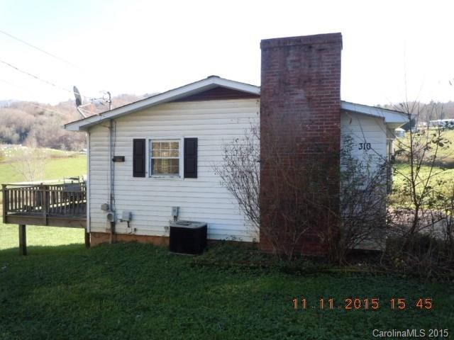 310 Howell Road, Unit 2 Canton, NC 28716 - Photo 2 of 5 a view of a house with a yard