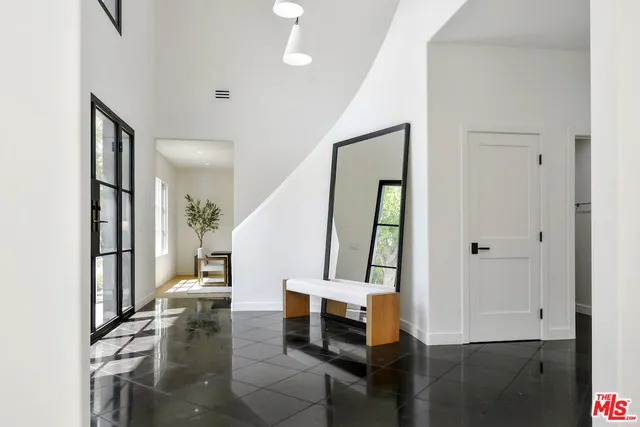 a view of entryway and workspace