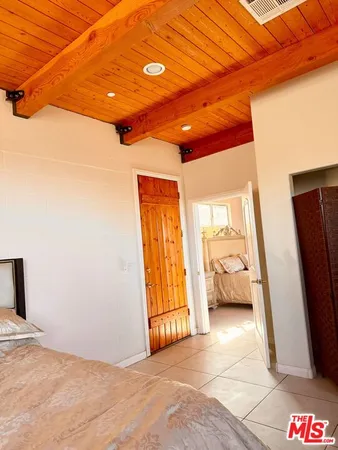 a view of livingroom with furniture and staircase