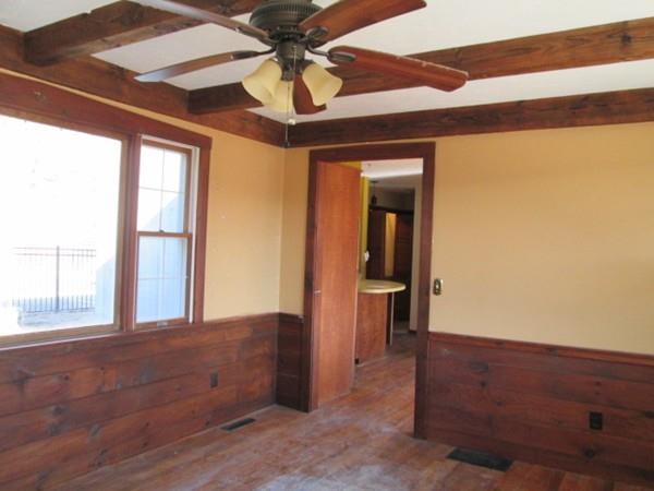 230 West Street Paxton, MA 01612 - Photo 11 of 23 an empty room with windows and ceiling fan