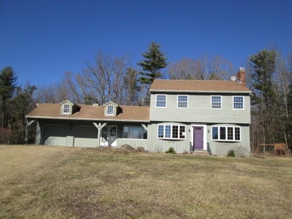 230 West Street Paxton, MA 01612 - Photo 18 of 23 a front view of a house with garage