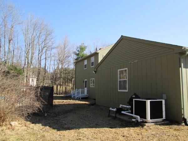 230 West Street Paxton, MA 01612 - Photo 19 of 23 a backyard of a house with garage