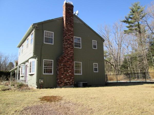 230 West Street Paxton, MA 01612 - Photo 20 of 23 a front view of a house with a yard