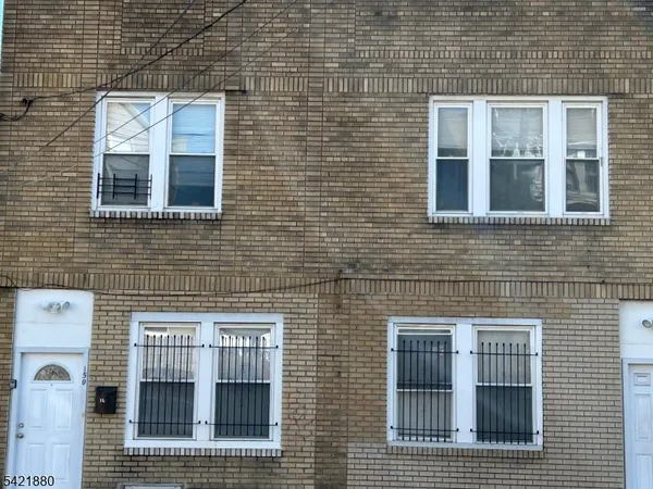 a kitchen with stainless steel appliances granite countertop a stove a refrigerator and a sink