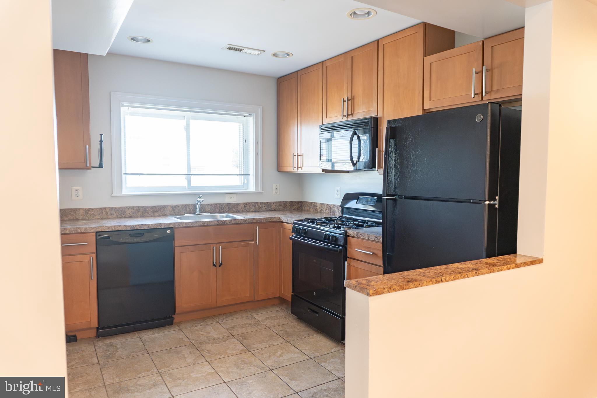 36 T Street Northeast, Unit 202 Washington, DC 20002 - Photo 1 of 12