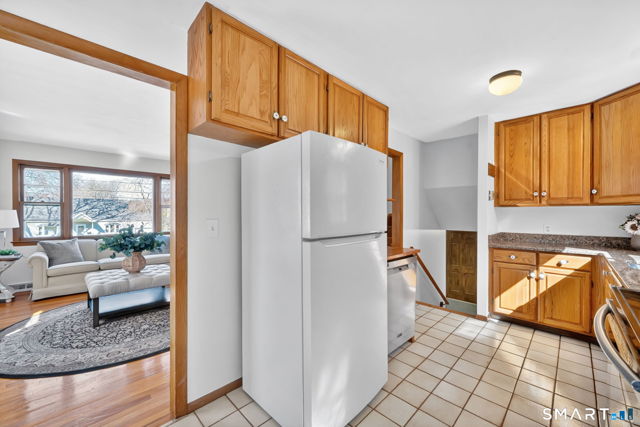 203 Brentwood Road Newington, CT 06111 - Photo 11 of 39 Kitchen looking down toward lower (ground) level.