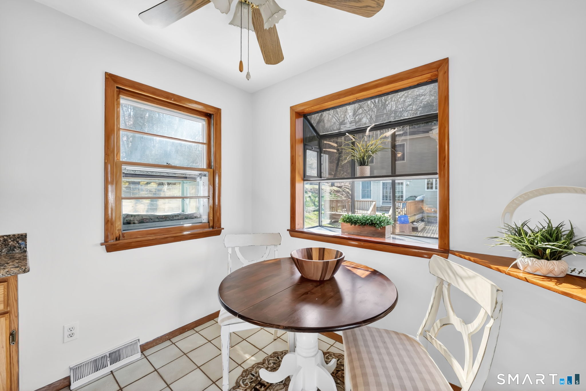 203 Brentwood Road Newington, CT 06111 - Photo 13 of 39 Notice the "catio" window on the left and the greenhouse window on the right.