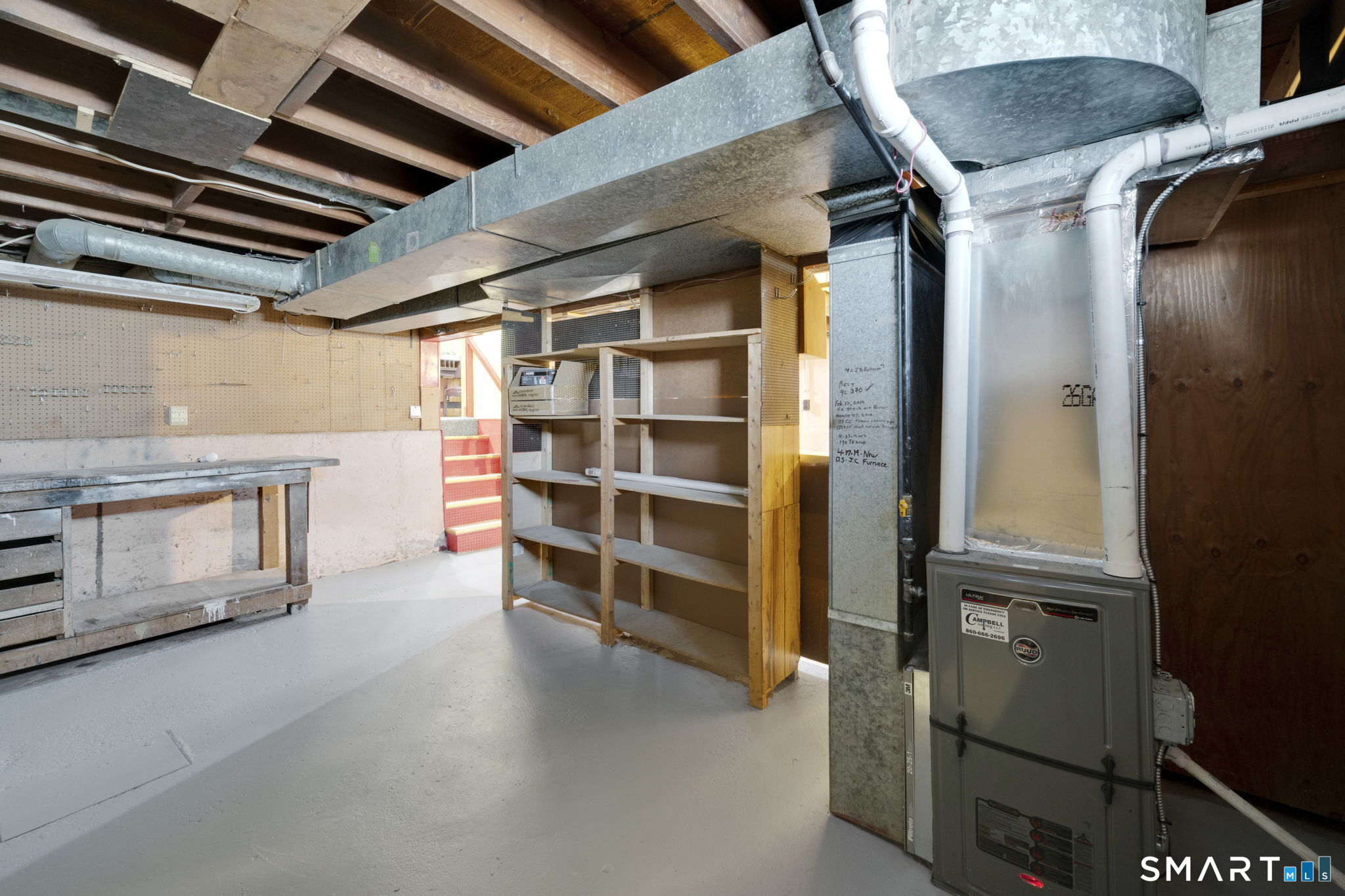 203 Brentwood Road Newington, CT 06111 - Photo 31 of 39 Basement showing the furnace - installed in 2016 when the homeowners converted from oil to gas.