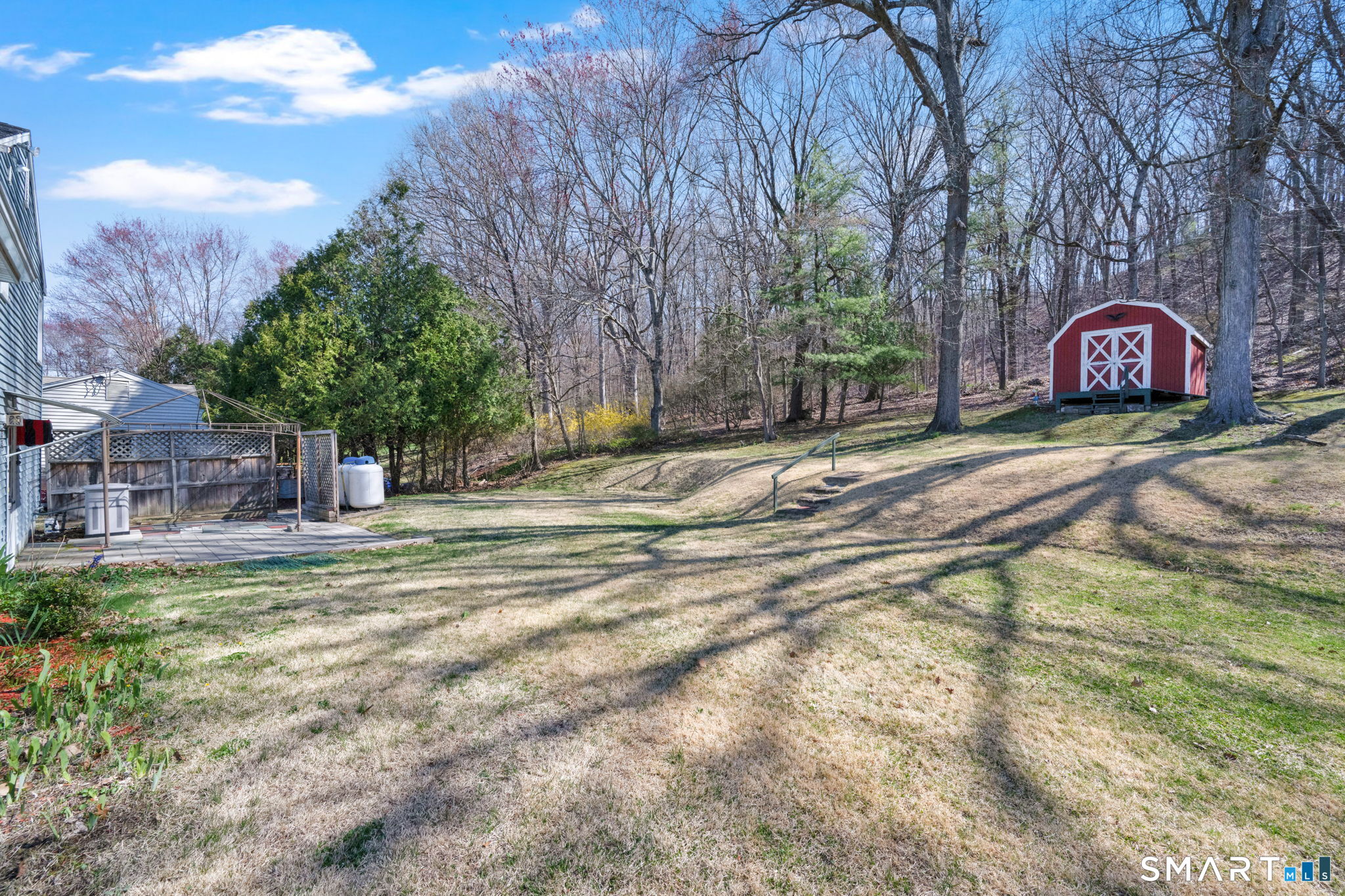 203 Brentwood Road Newington, CT 06111 - Photo 4 of 39 Back yard including gazebo, generator, and hand-built shed.