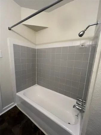 a bathroom with a bathtub