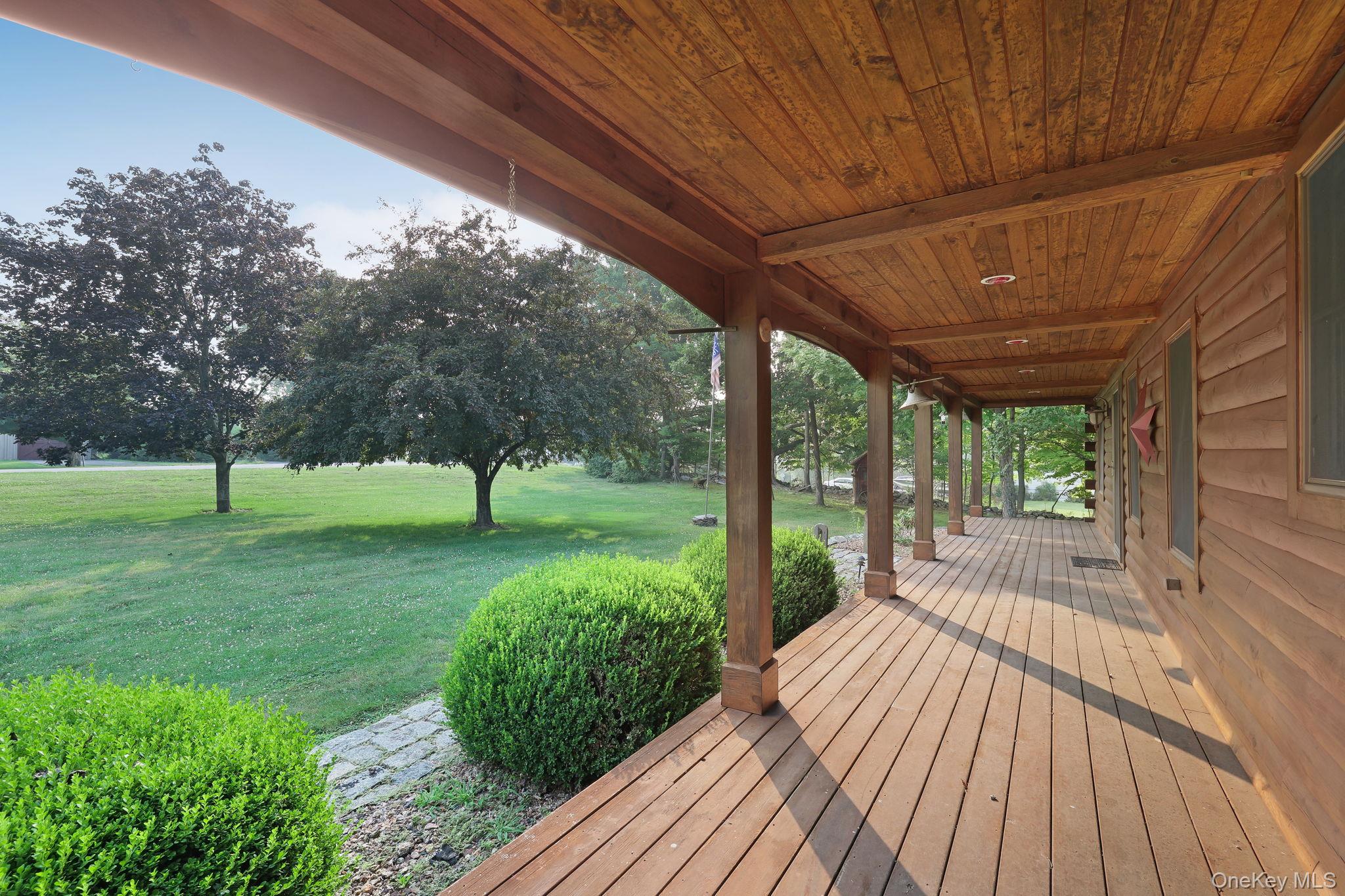 230 Post Road Slate Hill, NY 10973 - Photo 2 of 26 Enjoy evening sunsets on the front porch.