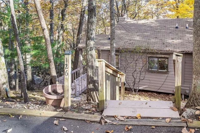 a toilet that has a tree on it