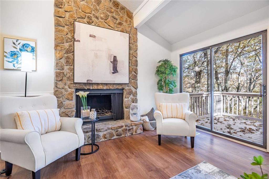 200 Villa Road, Unit 126 Jasper, GA 30143 - Photo 11 of 38 a living room with furniture a rug and a fireplace