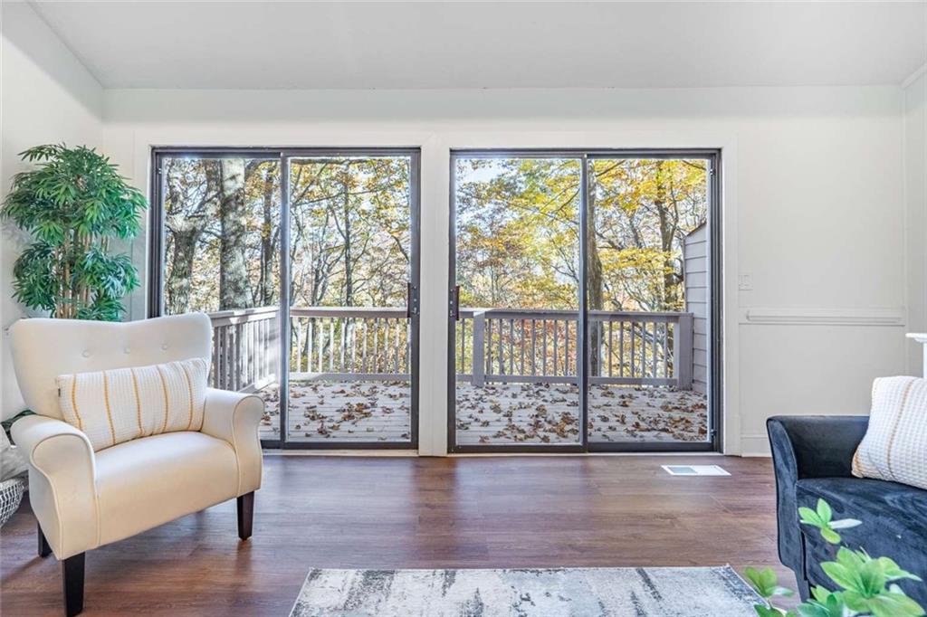 200 Villa Road, Unit 126 Jasper, GA 30143 - Photo 12 of 38 a living room with furniture and a large window