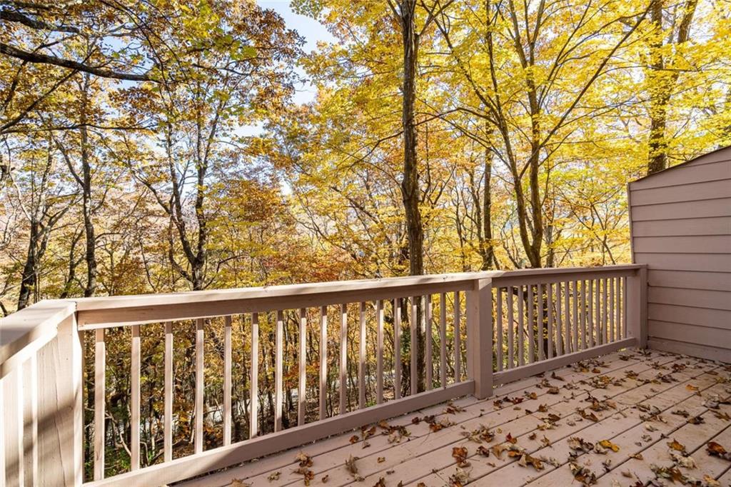 200 Villa Road, Unit 126 Jasper, GA 30143 - Photo 14 of 38 a balcony with trees