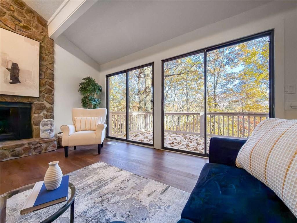 200 Villa Road, Unit 126 Jasper, GA 30143 - Photo 15 of 38 a living room with furniture and a large window