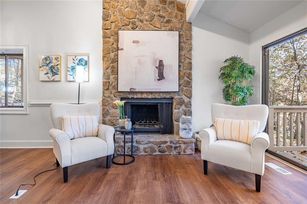 200 Villa Road, Unit 126 Jasper, GA 30143 - Photo 19 of 38 a living room with furniture and a fireplace