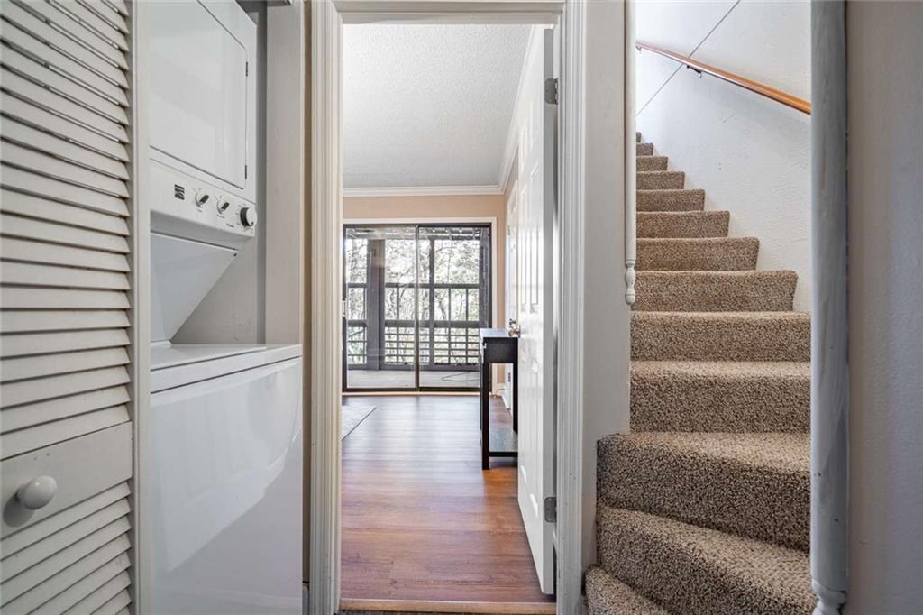 200 Villa Road, Unit 126 Jasper, GA 30143 - Photo 27 of 38 a view of a hallway with wooden floor and entryway