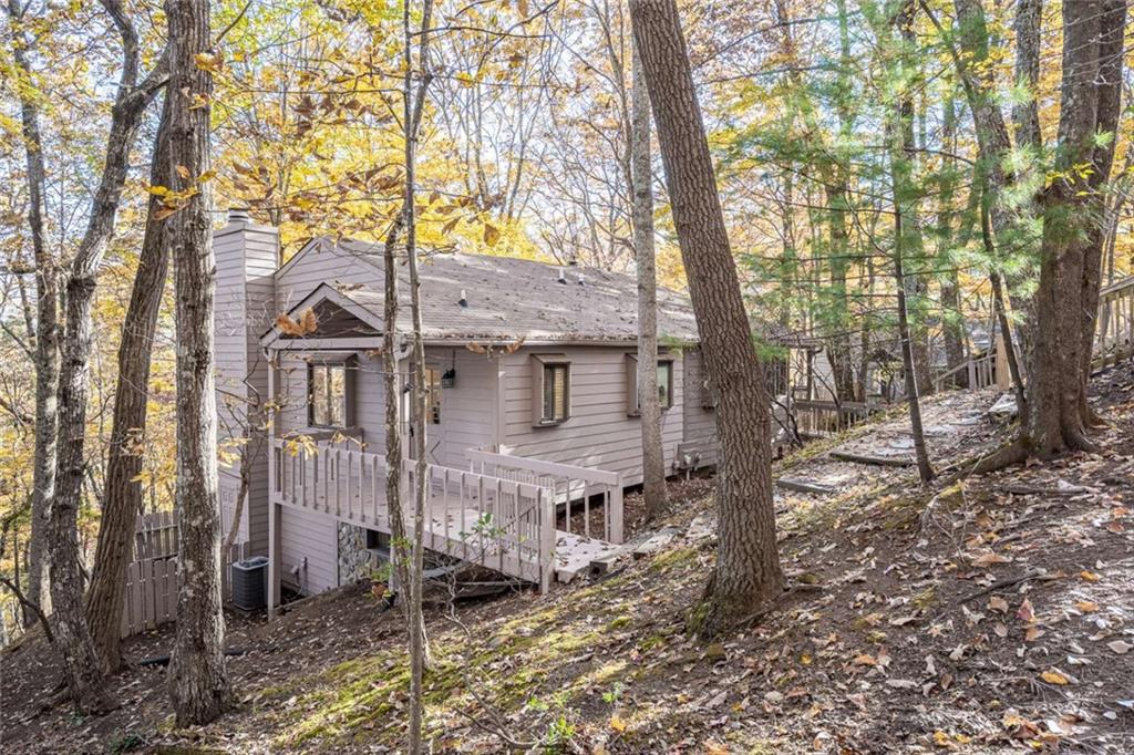 200 Villa Road, Unit 126 Jasper, GA 30143 - Photo 3 of 38 a view of a house with a yard
