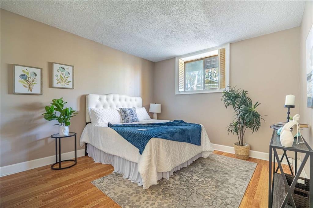200 Villa Road, Unit 126 Jasper, GA 30143 - Photo 33 of 38 a living room with furniture and a potted plant