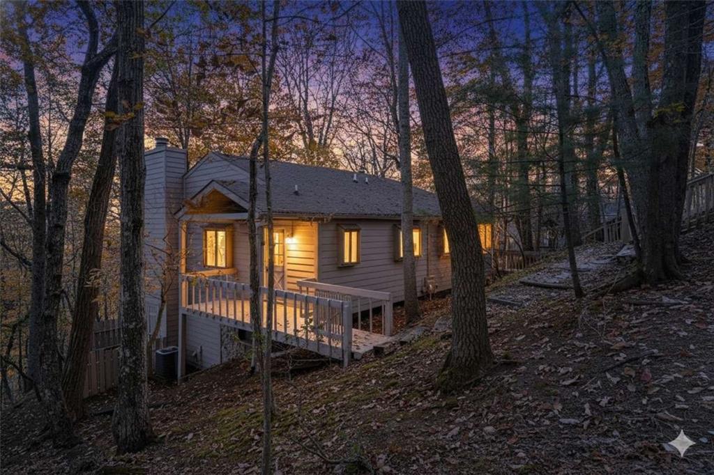 200 Villa Road, Unit 126 Jasper, GA 30143 - Photo 36 of 38 a view of a house with a yard