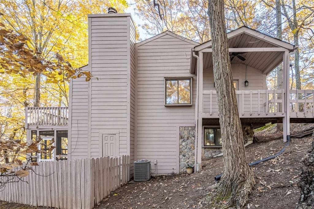200 Villa Road, Unit 126 Jasper, GA 30143 - Photo 4 of 38 a view of a house with a yard