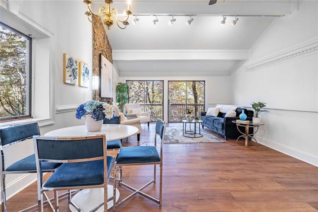 200 Villa Road, Unit 126 Jasper, GA 30143 - Photo 9 of 38 a living room with furniture and a large window