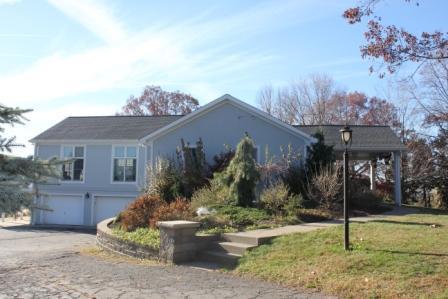64 Devils Den Road Burgettstown, PA 15021 - Photo 15 of 18 Facade/Exterior Front. Front and Side of Home with 2 car intregal garage