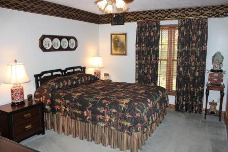 Master Bedroom. The Master Bedroom is spacious and the clothes closet is lighted and has organizers.